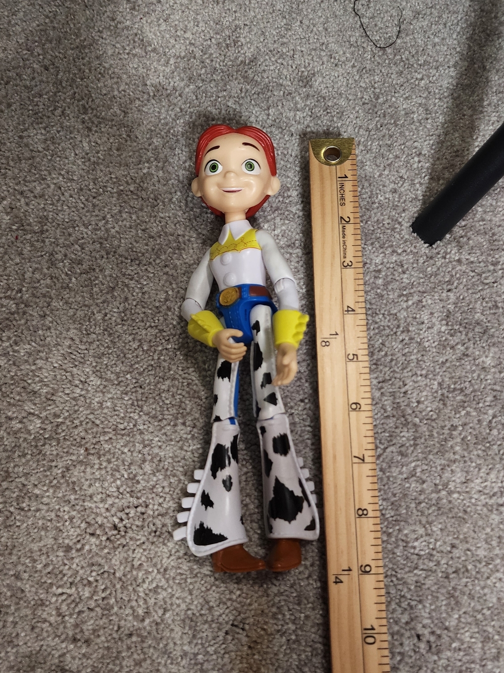 Disney Cowgirl Jessie Action Figure in White, Yellow, Blue